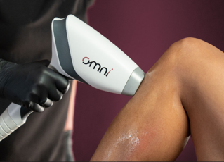 Omni laser hair removal being used on model